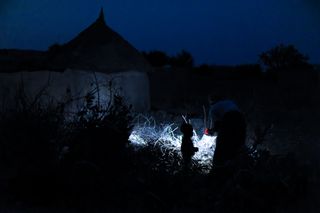 Evening shot of Lighting story by Iwan Baan and Francis Kéré for Zumthobel