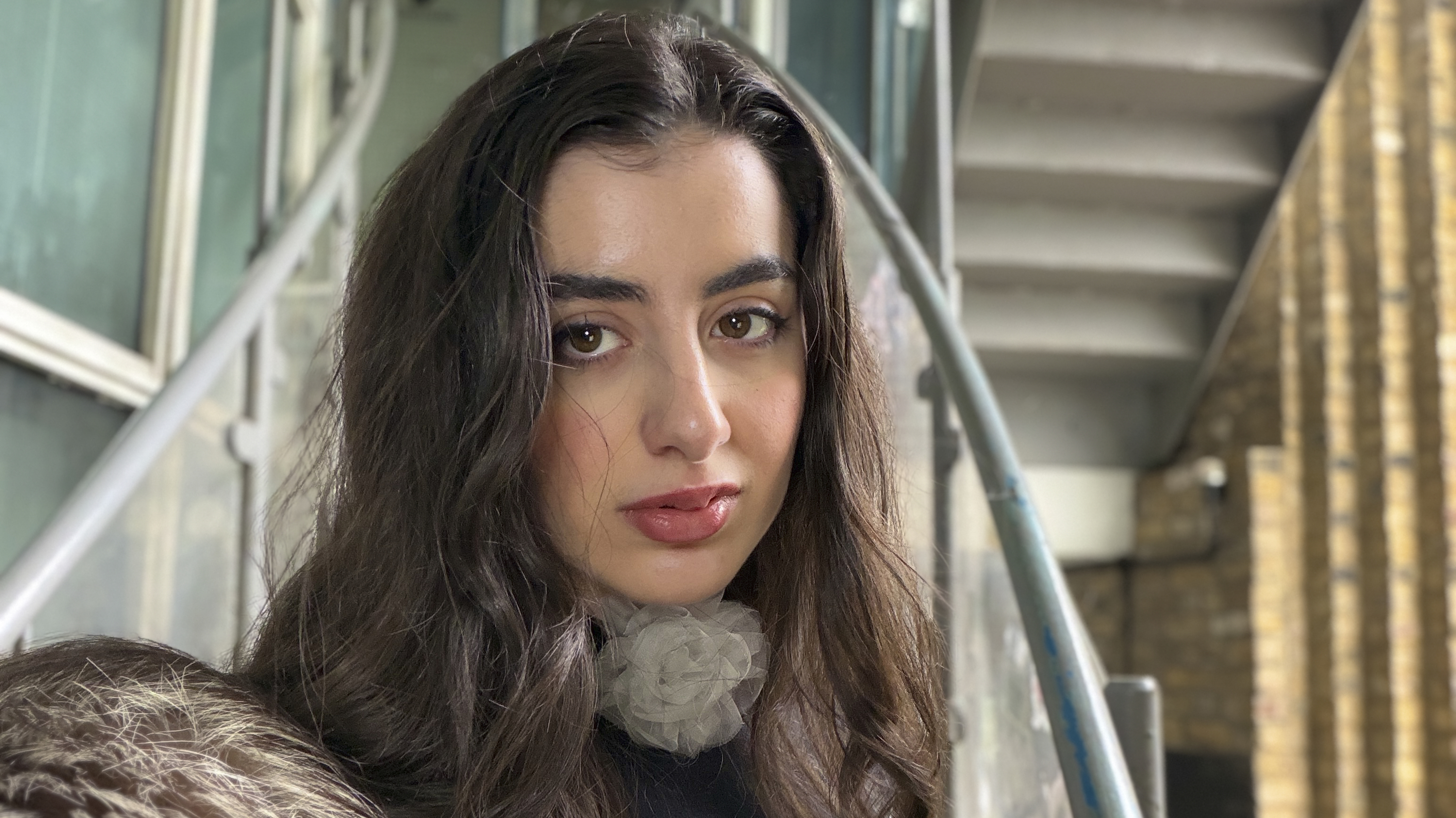 A selfie snapped by a model while testing the Godox LR30Bi LED. We can see a reflection of the ring light in her eyes.