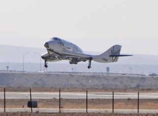 Virgin Galactic's SpaceShipTwo lands in the Mojave Desert, CA, after its historic first supersonic test flight on April 29, 2013.
