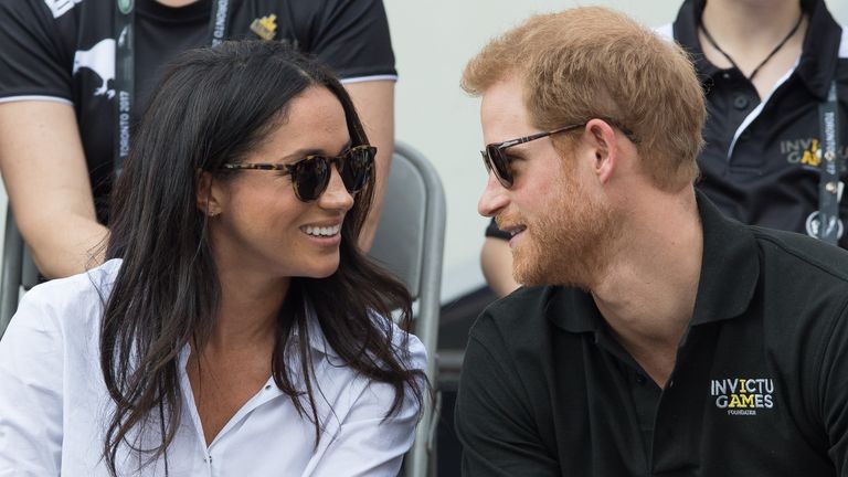 Meghan Markle's style message as she and Prince Harry appeared together at the wheelchair tennis on day 3 of the Invictus Games Toronto 2017