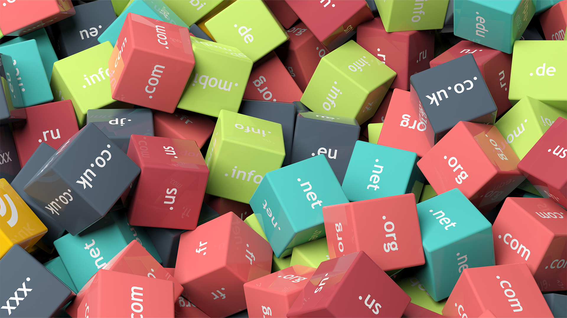 A pile of multi-colored cubes with regional domain options such as .co.uk and .org.