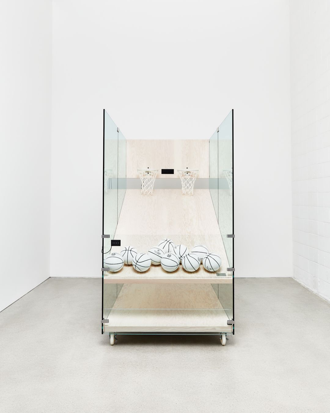 Reigning Champ basketball arcade game made of wood and glass front photo