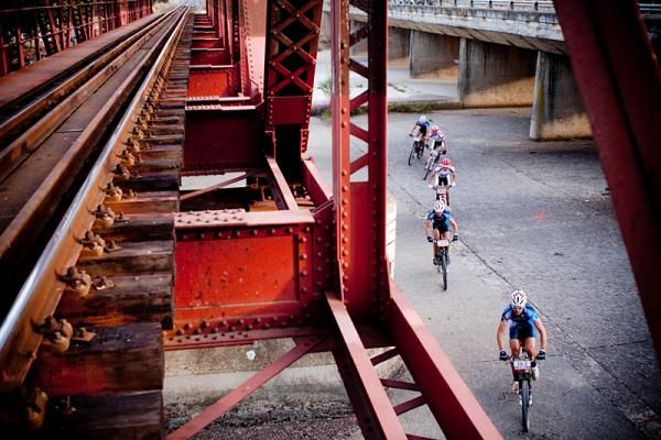 Riders make their way under the Wolsley bridge