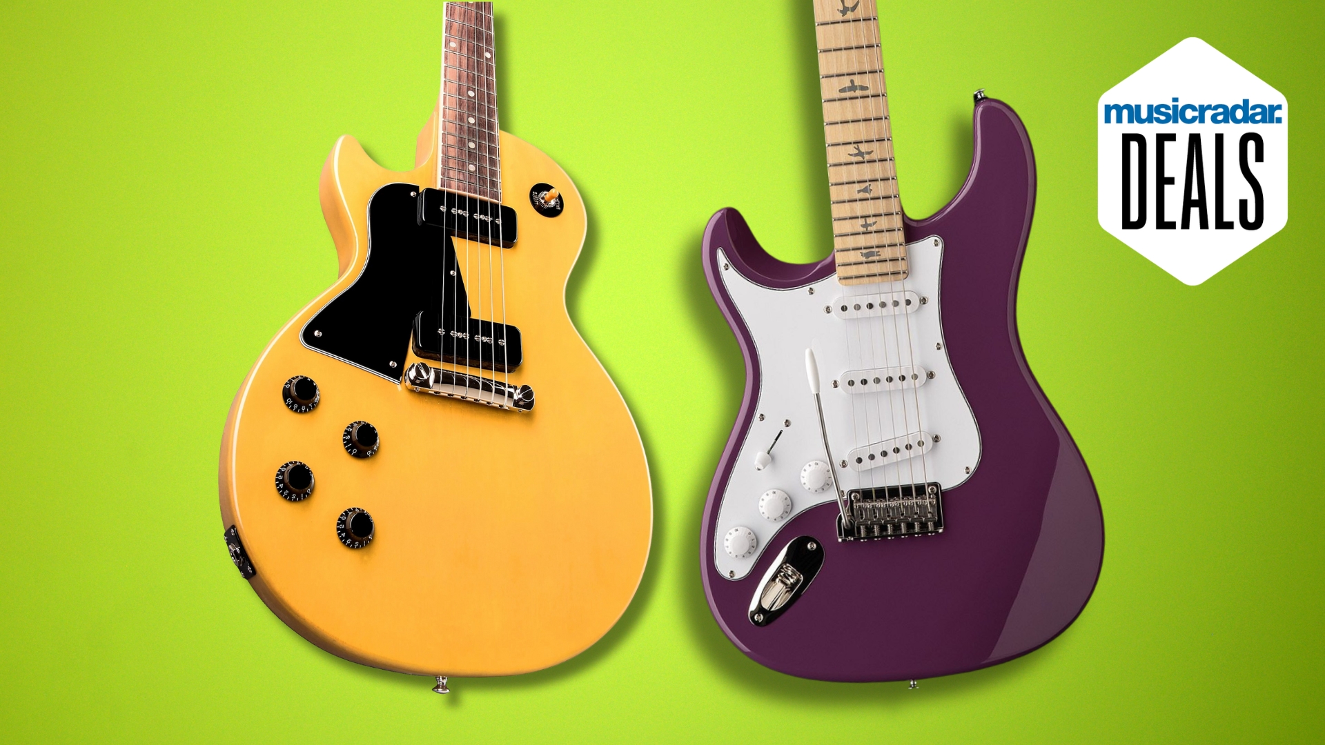 Close up of Gibson and PRS left-handed guitars on a green background