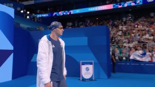 French swimmer Maxime Grousset approaches the pool.