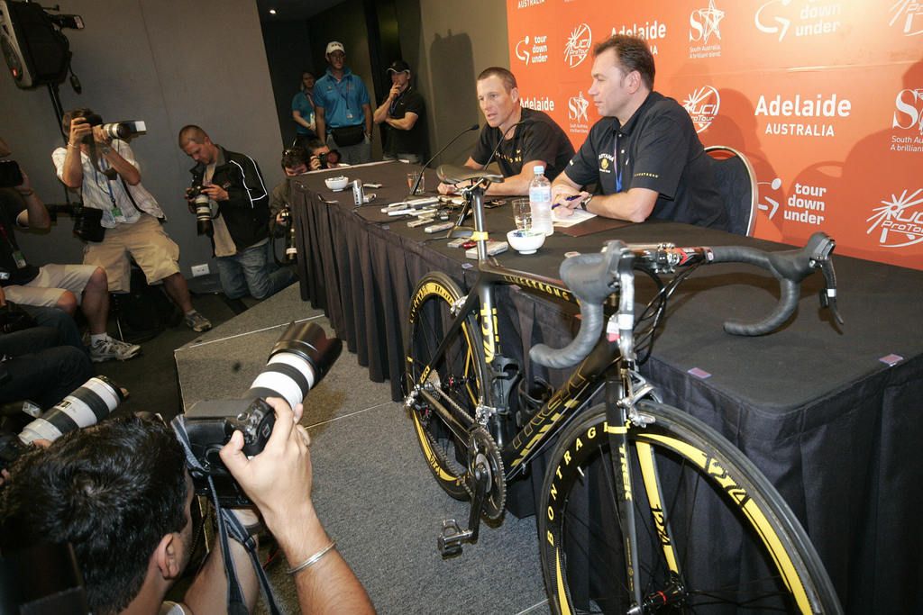 Lance Armstrong and Astana team manager Johan Bruyneel with the press ahead of the race in 2009