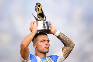 Argentina striker celebrates with his Copa America Golden Boot after scoring the winner for Argentina in the final against Colombia.