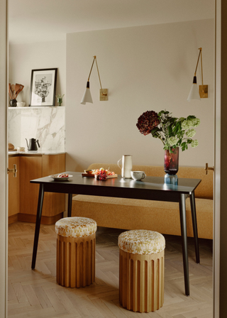 A small dining room with stool seating