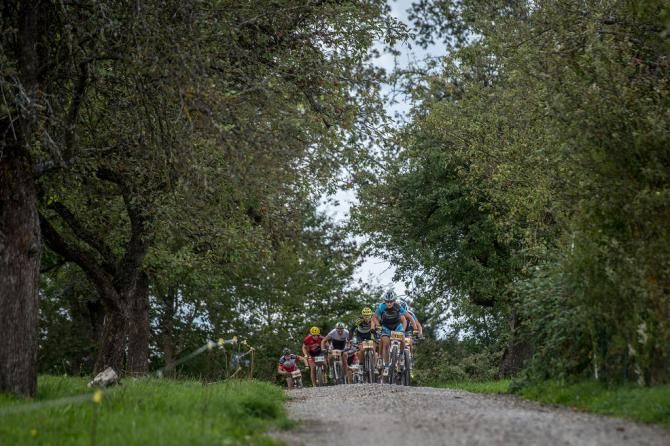 Riders fly along roads