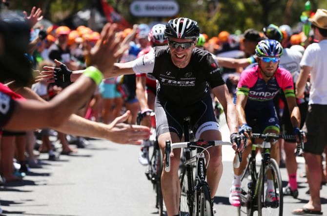 Jens Voigt waves farewell on the way up Willinga Hill