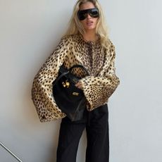 Elsa Hosk in a leopard print jacket