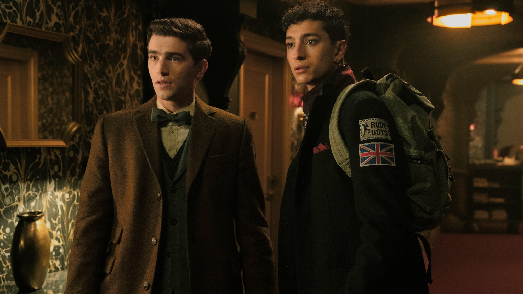 (L to R) George Rexstrew as Edwin Payne and Jayden Revri as Charles Rowland both looking shocked. 