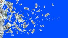 money blowing in blue sky