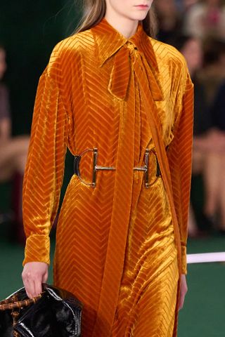 detail image of a horsebit accessory on the Gucci fall/winter 2025 runway