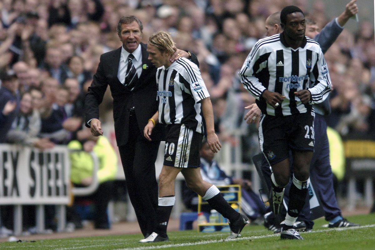 Craig Bellamy of Newcastle United is substituted by manager Graeme Souness during the Premier League match against Manchester City at St. James' Park, October 2004