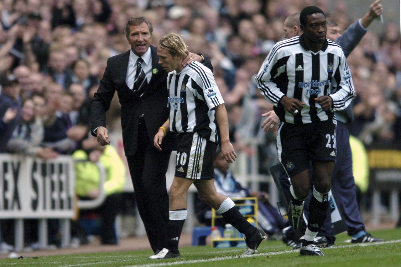 Craig Bellamy of Newcastle United is substituted by manager Graeme Souness during the Premier League match against Manchester City at St. James' Park, October 2004