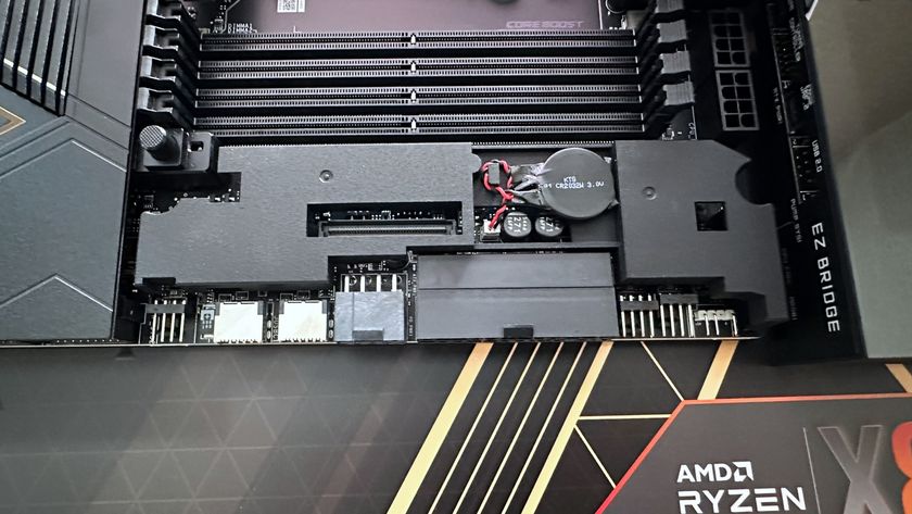 A photo showing an MSI MEG X870E Godlike X Edition motherboard, with its EZ Bridge system removed