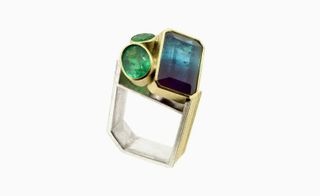 Monolith ring set with a bi-colour tourmaline and emeralds in 18-ct gold and sterling silver