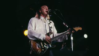 American musician, guitarist and singer Stevie Ray Vaughan (1954-1990) performs live on stage playing a Fender Stratocaster guitar (Number One) during a concert performance on the Riverboat SS President at the New Orleans Jazz & Heritage Festival in New Orleans, Louisiana on 22 April 1988
