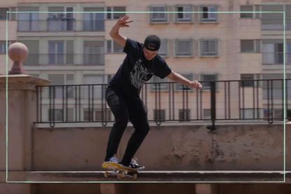 a close up of Leo Baker now skating on their skateboard