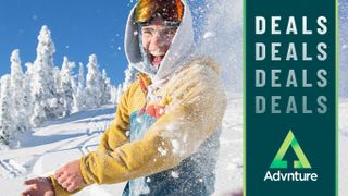 Man wearing Patagonia jacket throwing snowball