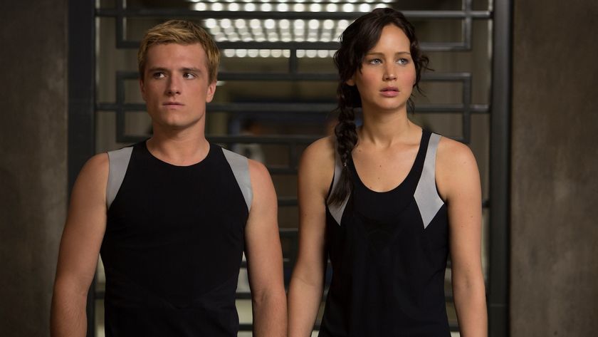 Josh Hutcherson and Jennifer Lawrence as Peeta and Katniss in training in Hunger Games: Catching Fire