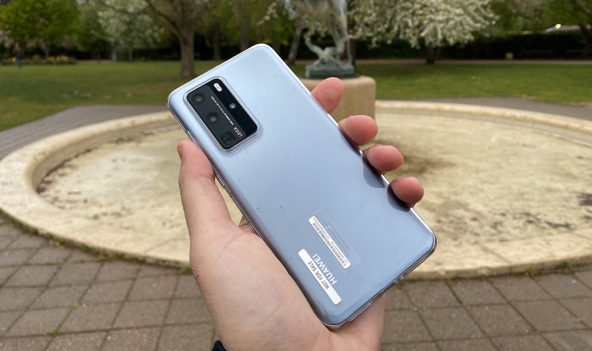 A Huawei P40 Pro held in one hand