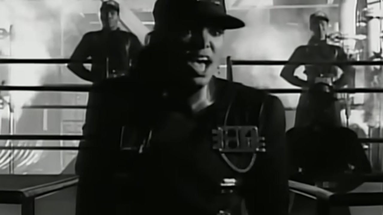 Janet Jackson singing in the video for the song, "Rhythm Nation"