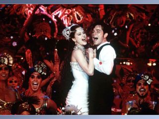 nicole kidman and ewan mcgregor embrace while singing in Moulin Rouge