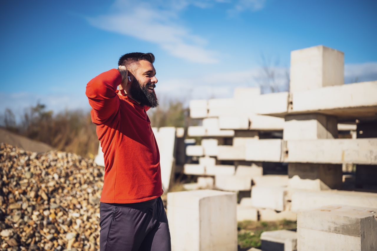 Man stretching his upper-body outdoors