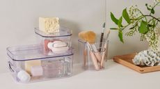 Clear makeup storage organizers with cosmetics