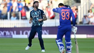 Reece Topley of England celebrates taking the wicket of Yuzvendra Chahal of India