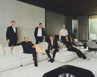 Alessio, Renato, Roberto, Alessandro, Leonardo and Susanna Minotti photographed at the Minotti headquarters in Meda with the brand’s ‘Supermoon’ sofa, designed by Giampiero Tagliaferri, ‘Vivienne’ dining chairs, designed by GamFratesi, and ‘Nico’ dining table, designed by Hannes Peer