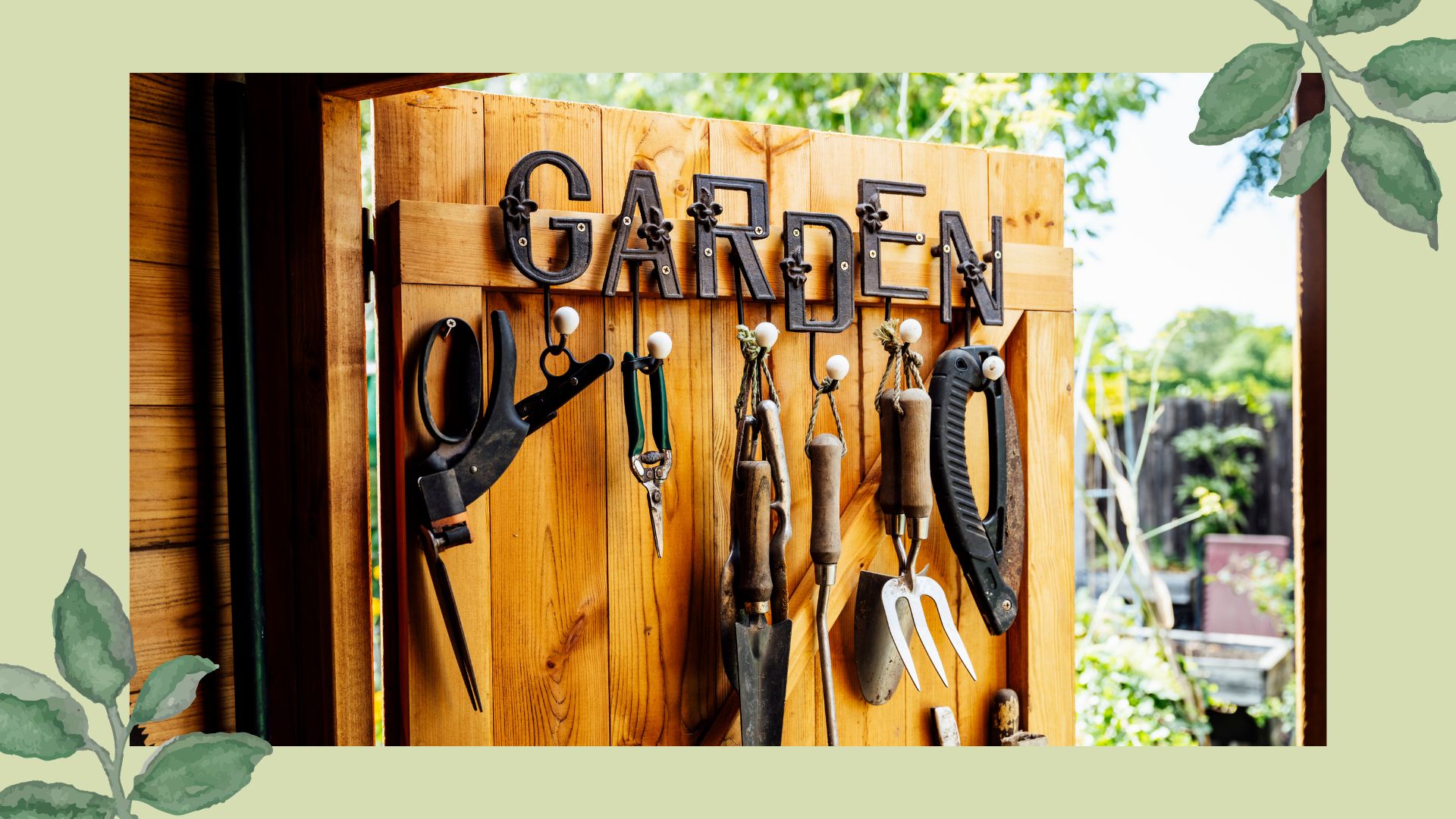 picture of organised shed door with tools hanging 