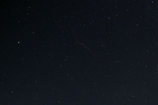 Richard Klofac captured this Draconid meteor vapor trail in his garden, the Czech Republic, October 2011.