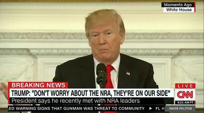 Trump tells lawmakers not to fear the NRA