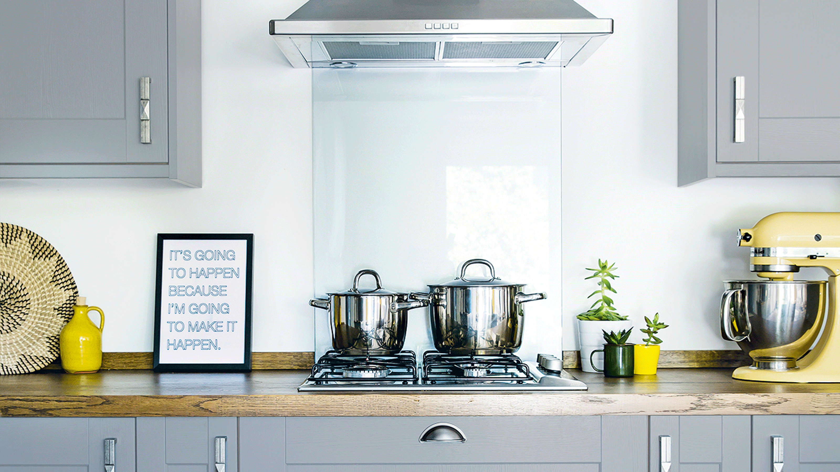 Gas stove in white themed kitchen