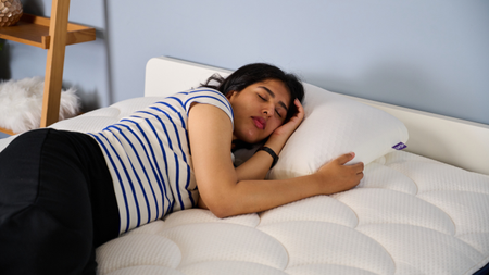 TG bedding writer sleeping on the Purple GridCloud pillow