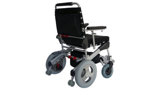 EZ Lite Cruiser Deluxe DX12: The wheelchair photographed from the side so that you can see the large grey back wheels for added stability on various terrain