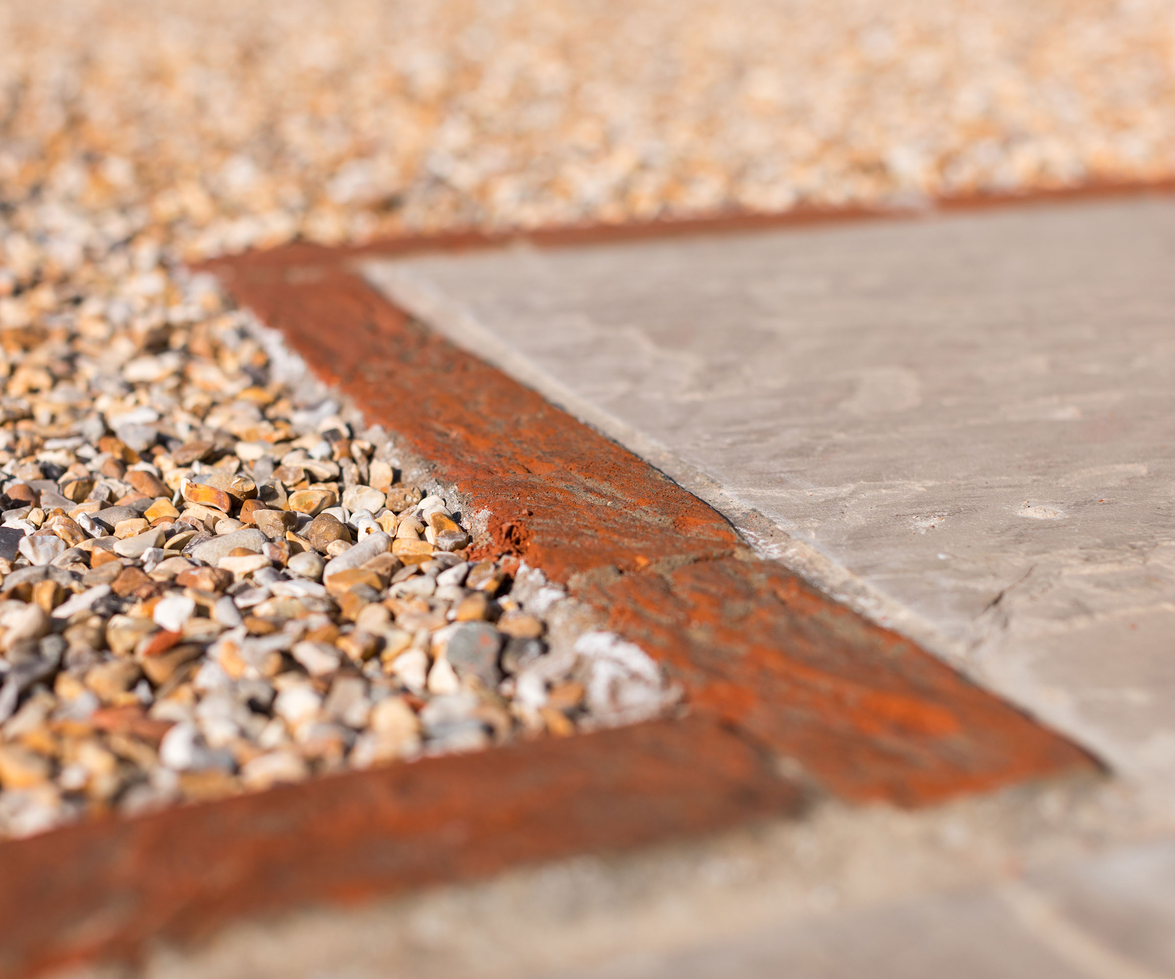 Gravel driveway with brick edging