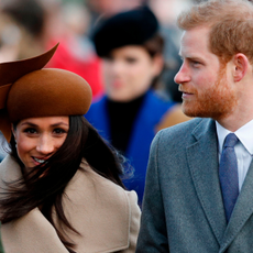 US actress and fiancee of Britain's Prince Harry Meghan Markle and Britain's Prince Harry arrive to attend the Royal Family's traditional Christmas Day