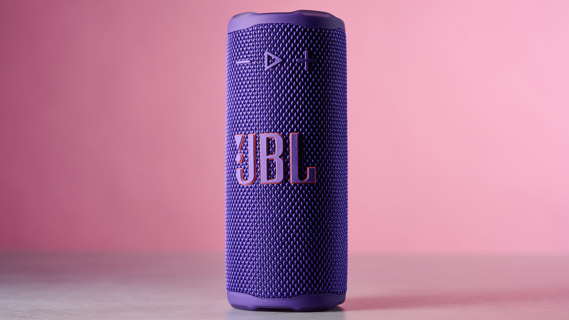 JBL Grip against pink background