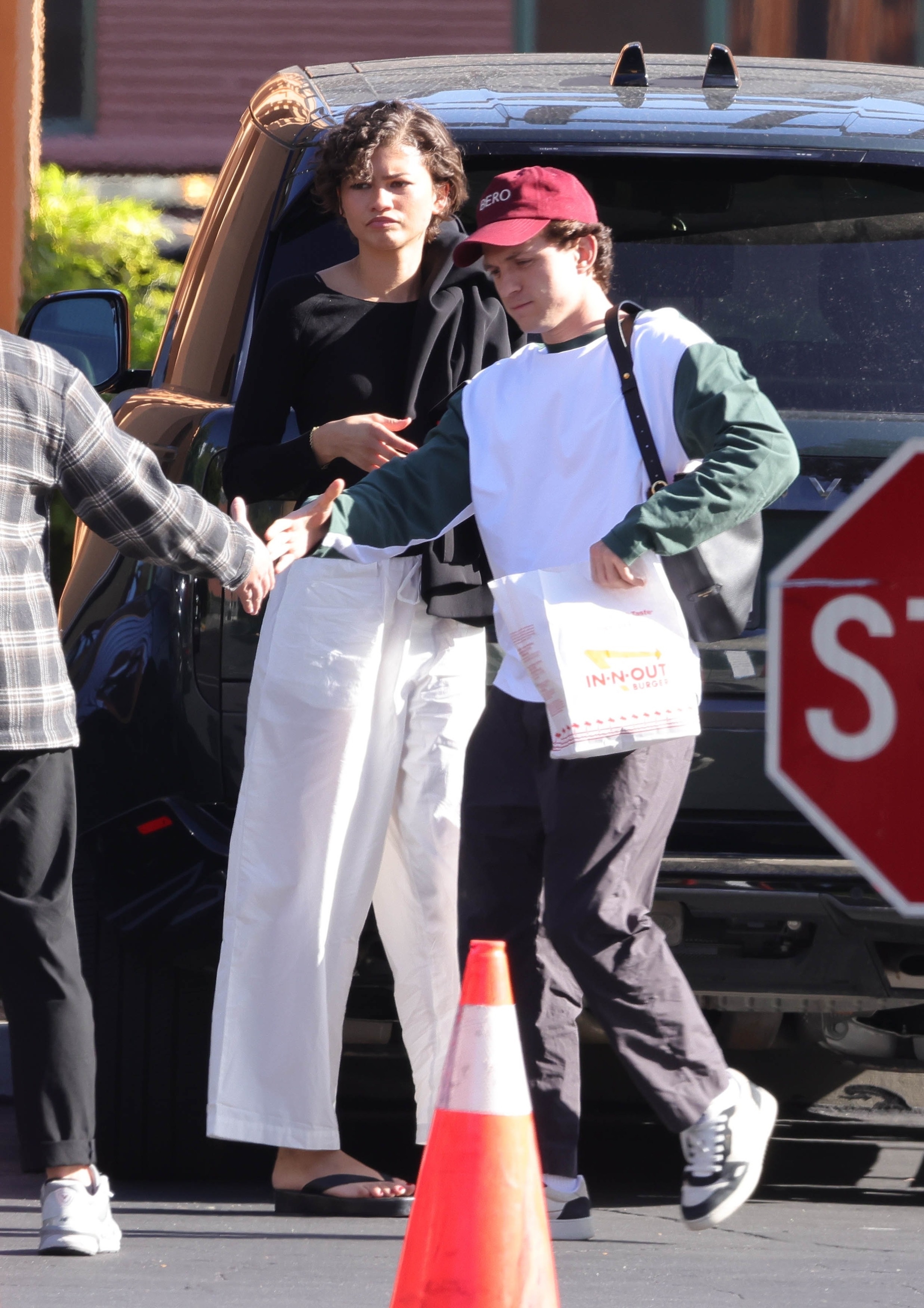 Zendaya styled the flip-flops trend as platform sandals April 25