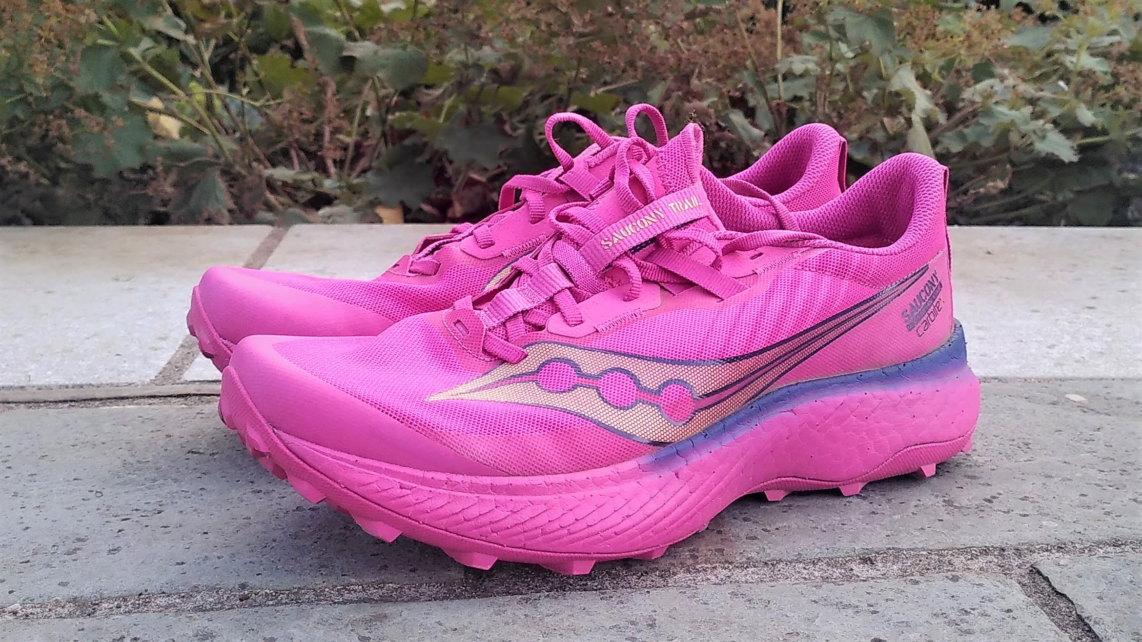 Saucony Endorphin Edge trail shoes in bright pink