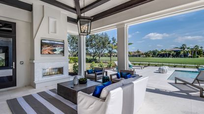 outdoor living room with tv