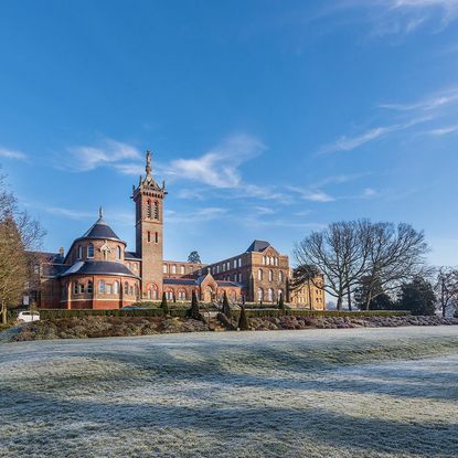 home exterior with sky and tree