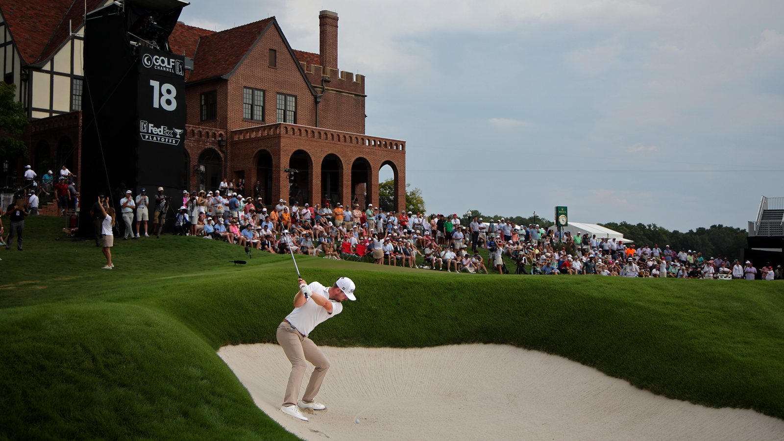 Ryan Gerard hits a bunker shot