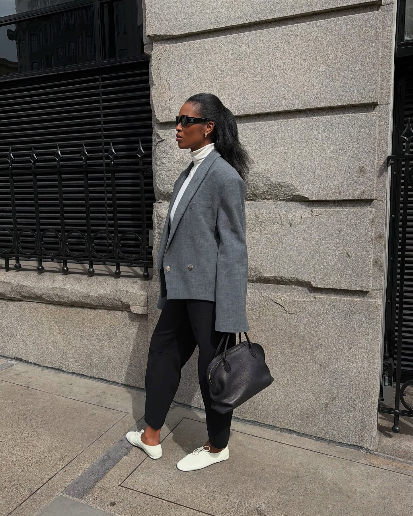 An image of @nlmarilyn wearing white derbies, one of the biggest shoe trends of summer 2026.
