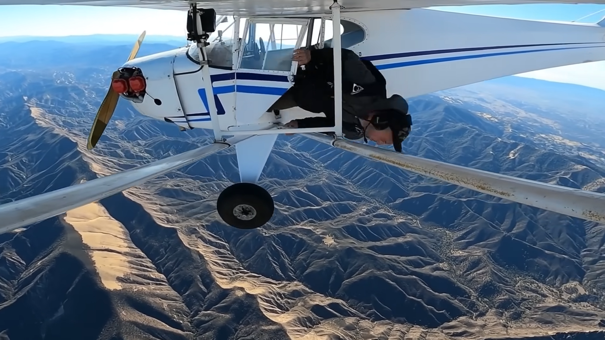 Trevor Jacob about to jump out of a plane.