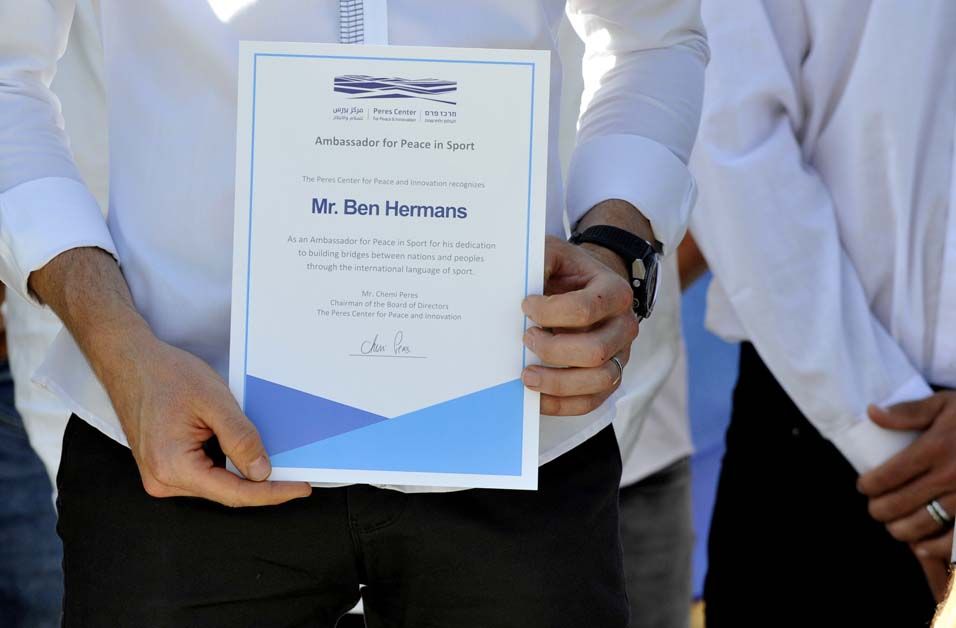 Ben Hermans with his certificate